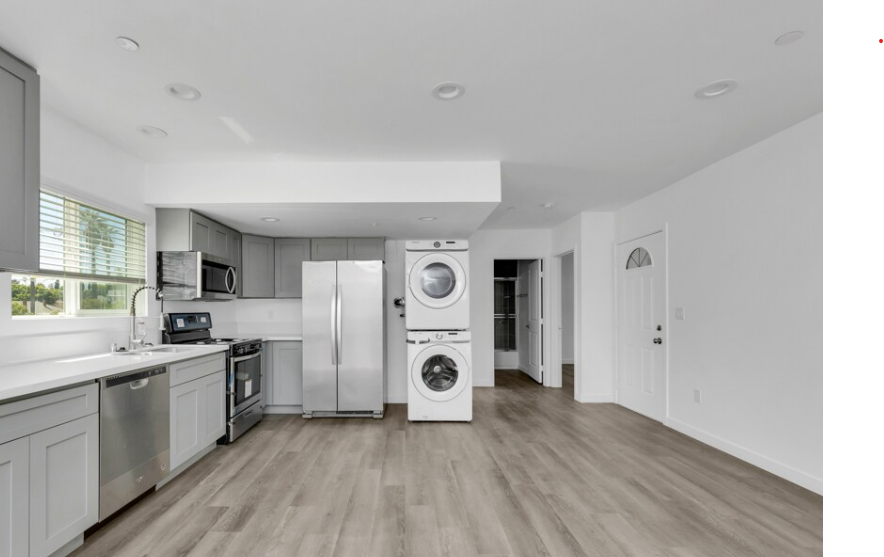 Interior - kitchen with in-unit laundry